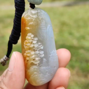 Beautifully crafted with sceneries on Yellow Natural Type A Jadeite Jade as a Pendant Necklace with certificate weigh 27.75 grams measurement 52.1 * 25.7 * 12.7 mm (pendant206)