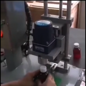 Bottle capping machine demo 2.mp4