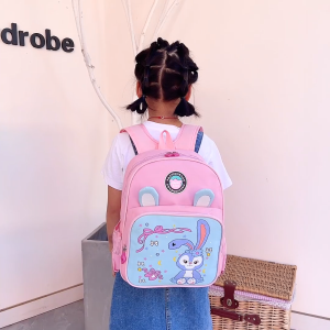 WANDER ชุดอนุบาลหญิง รูปแบบการ์ตูนน่ารัก เด็กใหม่ความจุขนาดใหญ่โรงเรียนอนุบาลกระเป๋าเป้สะพายหลังกระเป๋านักเรียนหญิง2483