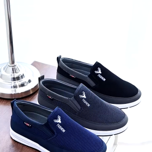 LEANNEL รองเท้าผ้าใบ สลิปออน สีพื้นแบบสวม พื้นหนานุ่มใส่ทน รองเท้าผ้าใบผู้ชาย