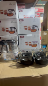 Bộ ấm trà  thuỷ tinh kèm 4 tách bình trà có lưới lọc