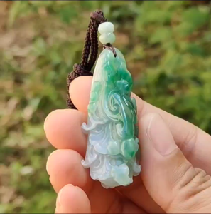 Lots Of Green on this Natural Type A Jadeite Pendant Necklace Crafted as Chinese Cabbage with Ruyi Symbols of Wealth rolling in good luck and prosperity certificate included weigh 15.27 grams 47.9 * 19.6 * 14.8 mm (pendant30)