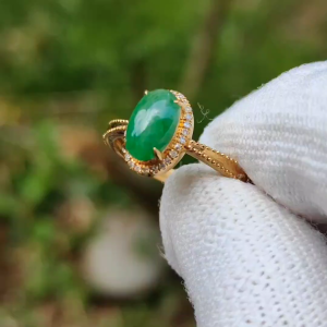 Green Natural Type A Jadeite Jade Cabochon 8.8 * 5.6 * 2.5 mm crafted with oval shape set on 18k Gold as ring with certificate weighs 1.92 grams (18kring25)
