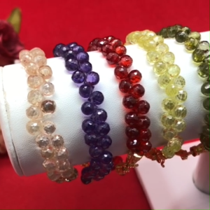 สร้อยข้อมือมณีใต้น้ำแท้ หัวจรวด ความยาว 7 นิ้ว สีแชมเปญ ม่วง โกเมน เหลือง เขียวส่อง ชุบทอง เสริมบารมี ดีไซส์สวย แฟชั่น