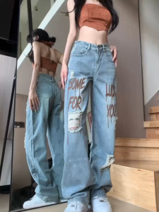 Fashion Retro Jins Robek Pria dan Wanita Niche Tren Hip-hop Kepribadian Celana Lebar Lurus Longgar