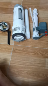 Bộ xả bồn cầu 2 nút nhấn dùng cho bệt hai khối liền khối