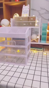 Kệ mỹ phẩm bằng nhựa 4 tầng trong suốt