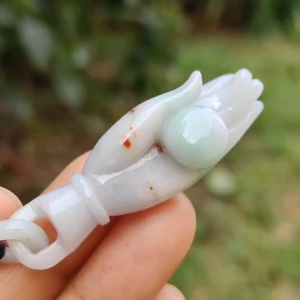 Light Green with Red patches Natural Type A Jadeite Jade crafted as Buddha Hand Pendant QIC labs approved certificate weighs 15.32 grams measurement 52.5 * 16 * 13.8 mm (pendant255)