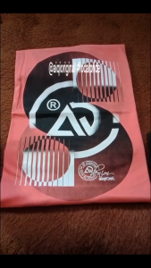 Aiqi Clothing Store T-shirt Distro Motif - Shiny Blade (Salmon Red) Bahan Kain Combed 24S Premium Tebal Lembut Bandung