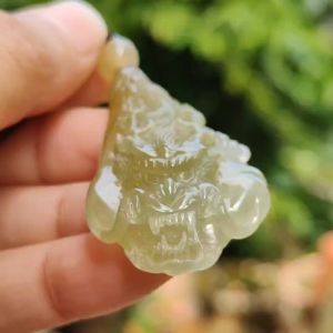 Premium Icy Yellow Natural Type A Jadeite Jade crafted with Dragon as Pendant certificate weighs 15.64 grams measurement 50.6 * 27 * 11.5 mm (pendant253)