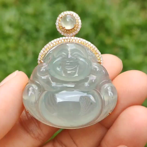 Icy Light Green Natural Type A Jadeite Jade Pendant crafted as Milo Buddha set on 18k gold with 1 icy cabochon and diamonds certificate included weigh 13.8 grams measurement 41.9 * 33.1 * 11.6 mm (18kp15)