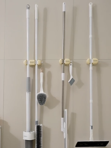Multifunctional Mop Broom Holder Rack: A Strong Adhesive Clips Solution