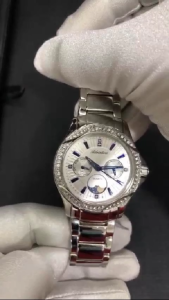 Adriatica Swiss Made Women's Moon Phase Steel Watch A3420.51B3QFZ - Multi Function with Swarovski Bezel Stones and Day/Date Display - Silver Blue, 38mm Case, Quartz Movement, Hard Glass, Stainless Steel Strap, Water Resistant