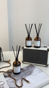 Aromatherapy Essential Oil Reed Diffusers: Home & Hotel Scent Solutions\\n\\n What Are Aromatherapy Essential Oil Reed Diffusers?\\n\\nAromatherapy essential oil reed diffusers are an innovative way to introduce fragrant aromas into your living spaces. These air fresheners feature a glass bottle filled with essential oils and reed sticks that absorb the oils and diffuse them into the air, creating a soothing and pleasant atmosphere.\\n\\n How They Work\\n\\nThe process of diffusion is simple yet effective. The reed sticks are placed in the bottle containing the essential oils, allowing the natural evaporation process to occur. As the oil evaporates, it rises through the reed sticks and releases a continuous, subtle aroma into the air. This method ensures a steady and long-lasting fragrance experience, making it perfect for both home and hotel environments.\\n\\n Benefits of Using Reed Diffusers\\n\\nReed diffusers offer numerous benefits beyond just their pleasing scents. They provide a more natural alternative to traditional air fresheners, which often contain synthetic fragrances and chemicals. Additionally, they are easy to use, require minimal maintenance, and can last for months with proper care. Moreover, the aromatherapeutic properties of essential oils can enhance mood, promote relaxation, and even improve air quality.\\n\\n Choosing the Right Aromatherapy Essential Oil Reed Diffuser\\n\\nSelecting the ideal reed diffuser for your needs involves considering several factors, including the size of the space, the desired fragrance, and the intended use. For instance, larger rooms may require a diffuser with a higher capacity, while smaller areas might benefit from a more compact design.\\n\\n Key Factors to Consider\\n\\n- **Size**: Choose a diffuser that suits the dimensions of your room or hotel suite. Larger bottles will typically provide a longer-lasting fragrance.\\n- **Fragrance**: Select a scent that complements your personal preferences and the ambiance of your space. Some popular options include lavender, eucalyptus, citrus, and vanilla.\\n- **Material**: Opt for diffusers made from high-quality materials like glass and bamboo, which are durable and eco-friendly.\\n\\n Popular Fragrances for Home and Hotel Use\\n\\n- **Lavender**: Known for its calming properties, lavender is a popular choice for bedrooms and bathrooms.\\n- **Eucalyptus**: With its invigorating scent, eucalyptus is ideal for living rooms and offices.\\n- **Citrus**: Fresh and uplifting, citrus scents are perfect for kitchens and dining areas.\\n- **Vanilla**: Warm and comforting, vanilla is a great option for living rooms and entryways.\\n\\n How to Use Aromatherapy Essential Oil Reed Diffusers\\n\\nTo get the most out of your reed diffuser, it's important to understand how to properly place and maintain it. By following these tips, you'll ensure a delightful fragrance experience that lasts for months.\\n\\n Proper Placement and Maintenance\\n\\n- **Placement**: Position your diffuser in a well-ventilated area away from direct sunlight, heat sources, and drafts. This will help maintain the longevity of the fragrance.\\n- **Maintenance**: Flip the reed sticks every few weeks to refresh the fragrance and extend the life of the diffuser. If the scent becomes too strong, simply remove some of the reeds.\\n\\n Maximizing the Fragrance Experience\\n\\n- **Adjust the number of reeds**: Increase or decrease the number of reeds depending on your preference for a stronger or lighter fragrance.\\n- **Combine scents**: Experiment with different fragrances by layering multiple diffusers in one space for a unique olfactory experience.\\n- **Use in conjunction with other diffusers**: Pair your reed diffuser with other aromatherapy methods, such as candles or sprays, for a multi-sensory experience.\\n\\n The Impact of Aromatherapy Essential Oil Reed Diffusers on Well-being\\n\\nAromatherapy essential oil reed diffusers have been shown to positively impact our mental and emotional health. By introducing specific scents into our environment, we can influence our mood, stress levels, and overall sense of well-being.\\n\\n Stress Reduction and Relaxation\\n\\nCertain essential oils, like lavender and chamomile, have been proven to reduce stress and anxiety. Incorporating these fragrances into your daily routine can help create a peaceful atmosphere conducive to relaxation and sleep.\\n\\n Enhancing Mood and Atmosphere\\n\\nOther essential oils, such as citrus and peppermint, can uplift your mood and increase energy levels. By using these scents strategically throughout your day, you can boost productivity and creativity while maintaining a positive outlook.\"