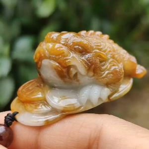 Redish Yellow Very Rare Natural Type A Jadeite Jade crafted with the Three Legs Toad as Pendant certificate weighs 49.67 grams measurement 51 * 32.8 * 24.3 mm (pendant258)