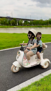 Xe máy điện trẻ em có nhạc có đèn kết nối Blutooth 2 chỗ ngồi XM-XW06