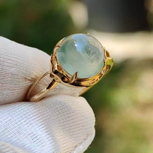 Icy Floating Green Patches Cabochon Natural Type A Jadeite Jade set on 18k gold as a ring with certificate weigh 2.06 grams measurement 8.9 * 8.8 * 4.2 mm finger size 16.8 mm (18kring19)