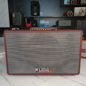 Loa karaoke xách tay Weimax T-125 công suất 750W tặng kèm 2 micro không dây âm thanh sống động mạnh mẽ chỉnh bass treble echo reverb kết nối đa dạng thời gian hoạt động 6-8h