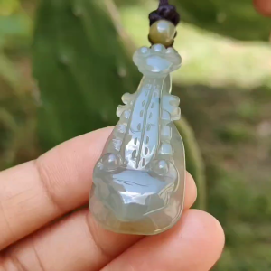 Semi Icy Rare Yellow and Green Natural Type A Jadeite Jade crafted as Ruyi musical instrument pipa as Pendant with certificate weigh 9.08 grams measurement 45.3 * 18.7 * 6.6 mm (pendant226)