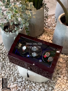 Hộp xoay đồng hồ cơ xoay lên cót 6 trưng bày 7 đồng hồ vỏ màu vân gỗ ruột nỉ lông cừu đen