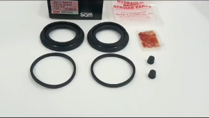 CALIPER KIT SAM KARET SEAL KIT REM CAKRAM DEPAN VITARA ESCUDO SIDEKICK 55100-56820