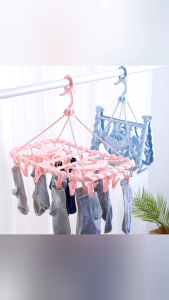 móc phơi quần áomóc kẹp.mắc dù phơi đồmóc chùm nhựa 32 kẹp.chùm kẹp nhựa HONGQIAN