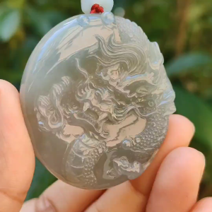 Light green with Brown fine quality Natural Type A Jadeite Pendant carved with dragon meaning wisdom Auspiciousness strength and independence with certificate weigh 41.21 grams 46 * 40.60 * 10.80 mm very suitable for daily wear (pendant91)