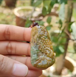 Rare quality Yellow with reddish brown and green Natural Type A Jadeite Jade crafted with sceneries as pendant certificate weigh 11.38 grams measurement 45.6 * 24.3 * 5.2 mm (pendant216)