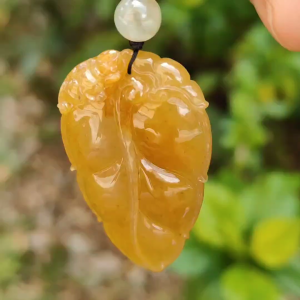 Very fine and old full Yellow Natural Type A Jadeite Pendant carved as a leave and a Mythical Beast on it with certificate weight 16.02 grams 44 * 26 * 10 mm meaning Good luck and auspiciousness (pendant107)