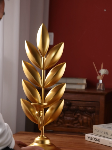 เอเชียตะวันออกเฉียงใต้เทียนวินเทจตกแต่งโต๊ะรับประทานอาหารไทยร้านนวดต้นไม้ประดับตกแต่งเชิงเทียนใบไม้สีทอง