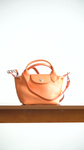 24 Xtra series limited color LOGO embossed cowhide dumpling bag womens bag mini crossbody hand makeup bag