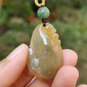 Rare Yellow Natural Type A Jadeite Jade crafted with Dragon Playing with Pearls as Pendant certificate weigh 6.33 grams measurement 32 * 21 * 6.5 mm (pendant217)