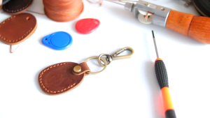 Luxury R Leather Keychain: The Ultimate Airtags Case for iPhone