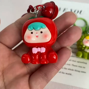 ตกแต่งกระเป๋าเป้สะพายหลังพวงกุญแจเรืองแสงกระดิ่งผลไม้สามมิติ