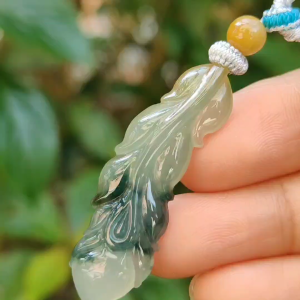 Green with Yellow two colors Natural Type A Jadeite Pendant carved as the Phoenix feather with QIC approved labs certificate weighs 5.83 grams 40.2 * 12.7 * 4.8 mm phoenix feather Symbol of Prosperity and Wealth Harmony Bliss in Marriage (pendant82)