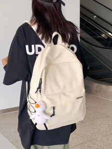 กระเป๋าสะพายคู่ขนาดใหญ่ความจุลำลองผู้ชายที่เรียบง่ายเดินทางกระเป๋าเป้สะพายหลังผู้หญิงนักเรียนมัธยมศึกษาตอนต้นโรงเรียนกันน้ำสำหรับนักศึกษามหาวิทยาลัย