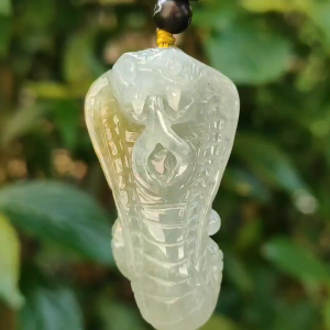 Light green and Yellow Natural Type A Jadeite Pendant carved as Snake symbols of rebirth transformation immortality and healing certificate included weigh 19.32 grams 47.3 * 25.7 * 13.3 mm suitable for daily wear (pendant76)