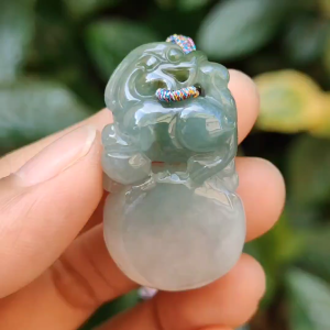 Light Green Natural Type A Jadeite Jade crafted with Lion as Pendant certificate weighs 14.94 grams measurement 36.6 * 20.5 * 10.8 mm (pendant249)