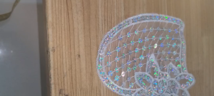 Hình kim sa may lên áo trang trí