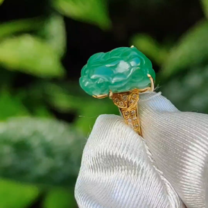 Green Natural Type A Jadeite Jade crafted as Pixiu set on 18k gold as a ring with certificate weigh 2.40 grams finger size 17mm measurement 12.5 * 7.9 * 7.3 mm (18kring20)