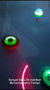 MAINAN ANAK GASING KARAKTER UFO NEW /GANGSING DENGAN LAMPU & MUSIK