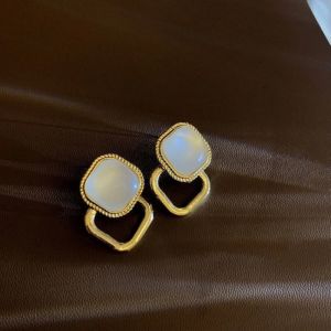 Fashionable fresh sweet pearl flower basket earrings for women niche design high-end earrings versatile and elegant ear accessories