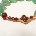Vòng tay lắc tay đá thạch anh dâu charm hoa 4 cánh garnet mạ vàng may mắn phong thủy Udumbara quà biếu tặng sang trọng. 