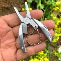Portable MINI Stainless Steel Multi Tool Pocket Multifunctional Tool for Travel Foldable Multipurpose Plier Multitool Keychain Screwdriver with Led Light. 