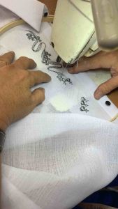 Mens white polo barong shirt Miyake fabric with decorative embroidery short sleeves