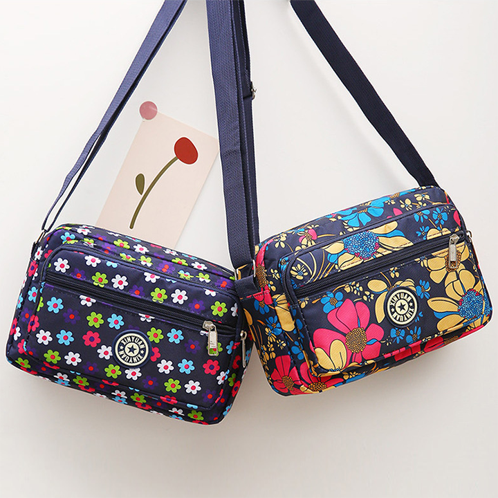 Túi đeo chéo họa tết vải dù chống thấm nước cao cấp size 24cm | Lazada.vn