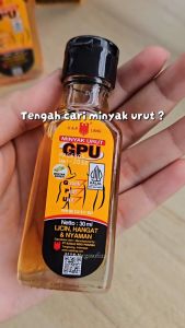 Minyak urut GPU Gosok-pijat-LicinHangat @ nyaman Cap Lang Liniment Oil GPU Eagle Brand.