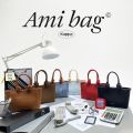 KAPPABKK✨ Ami Bag กระเป๋าหนังกลับ ทรงหูจับสุดเก๋. 