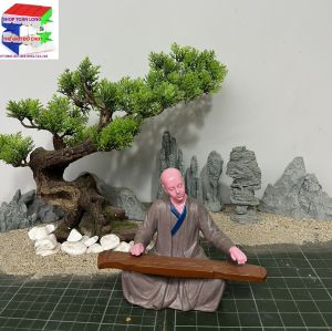 Tượng tu sĩ đánh đàn tăng nhân đánh đàn nhà sư đánh đàn trang trí bàn trà tiểu cảnh non bộ bể cá bon sai ghép lũa..
