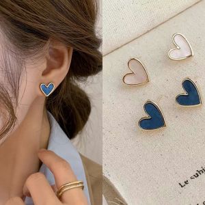 Gnker Heart Bling Zircon Stone Rose Gold Stud Earrings for Women Fashion Jewelry 2021 New Gift. Blue and white heart-shaped earrings with rose gold accents